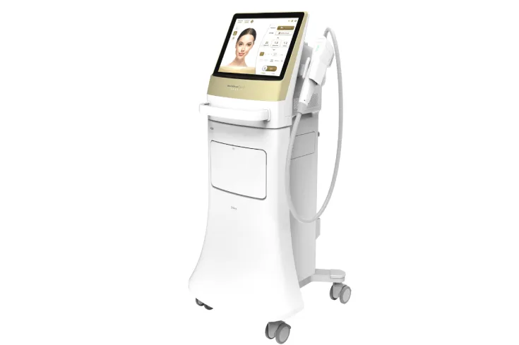 Mobile aesthetic treatment device with a touchscreen display and connected handpiece on wheels for skin procedures.